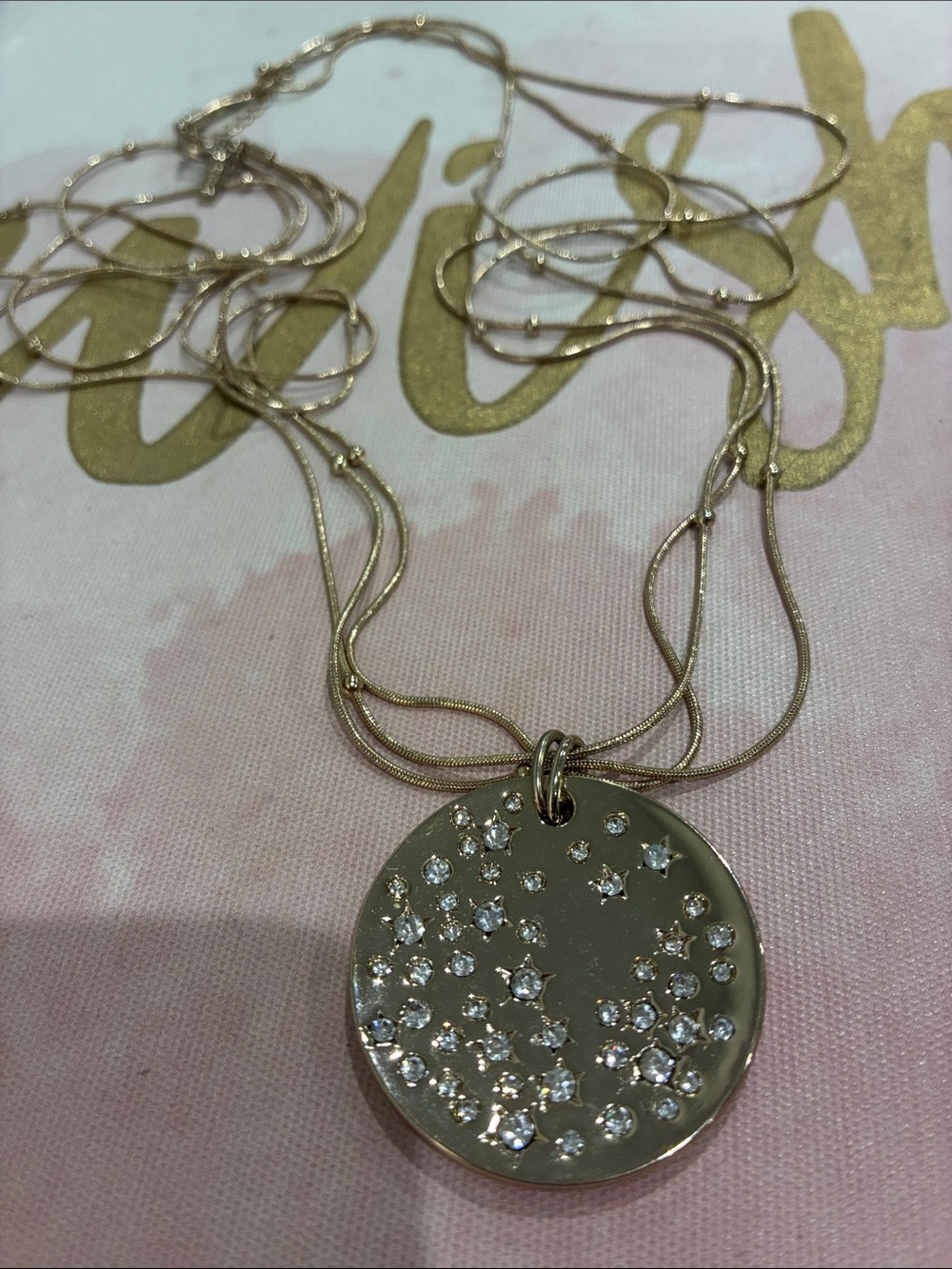 Gold Disc Pendant Necklace with Crystal Starburst Accent